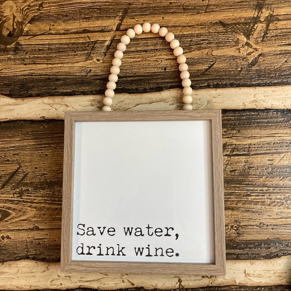 Wood sign with wood bead hanger NWOT